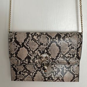 Faux snake purse. Like new!